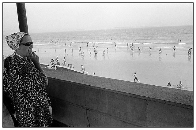Revere Beach Woman Smoker by Roy DiTosti